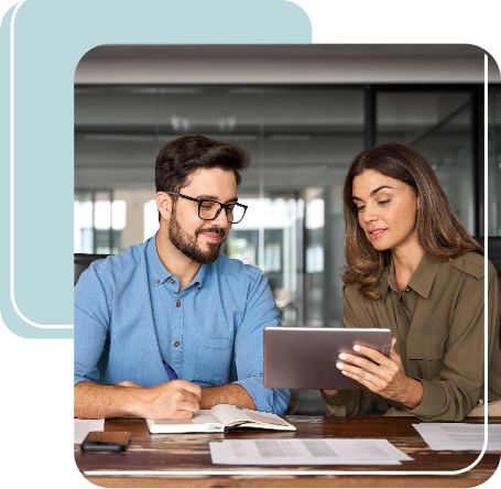 Photo of a man and a woman at the desk